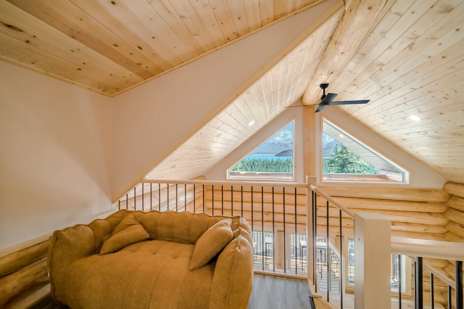 Loft overlooking lake and cabin living area